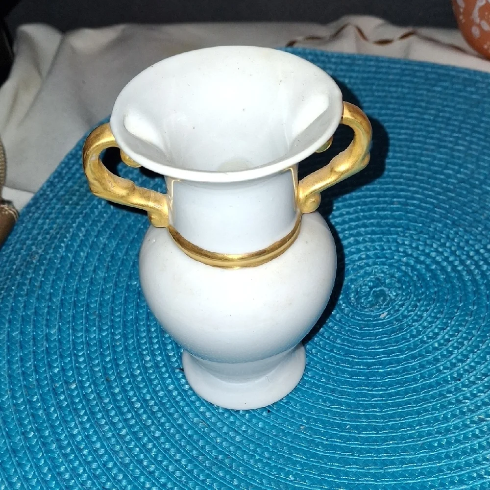 Elegant White Vase with Gold Accents